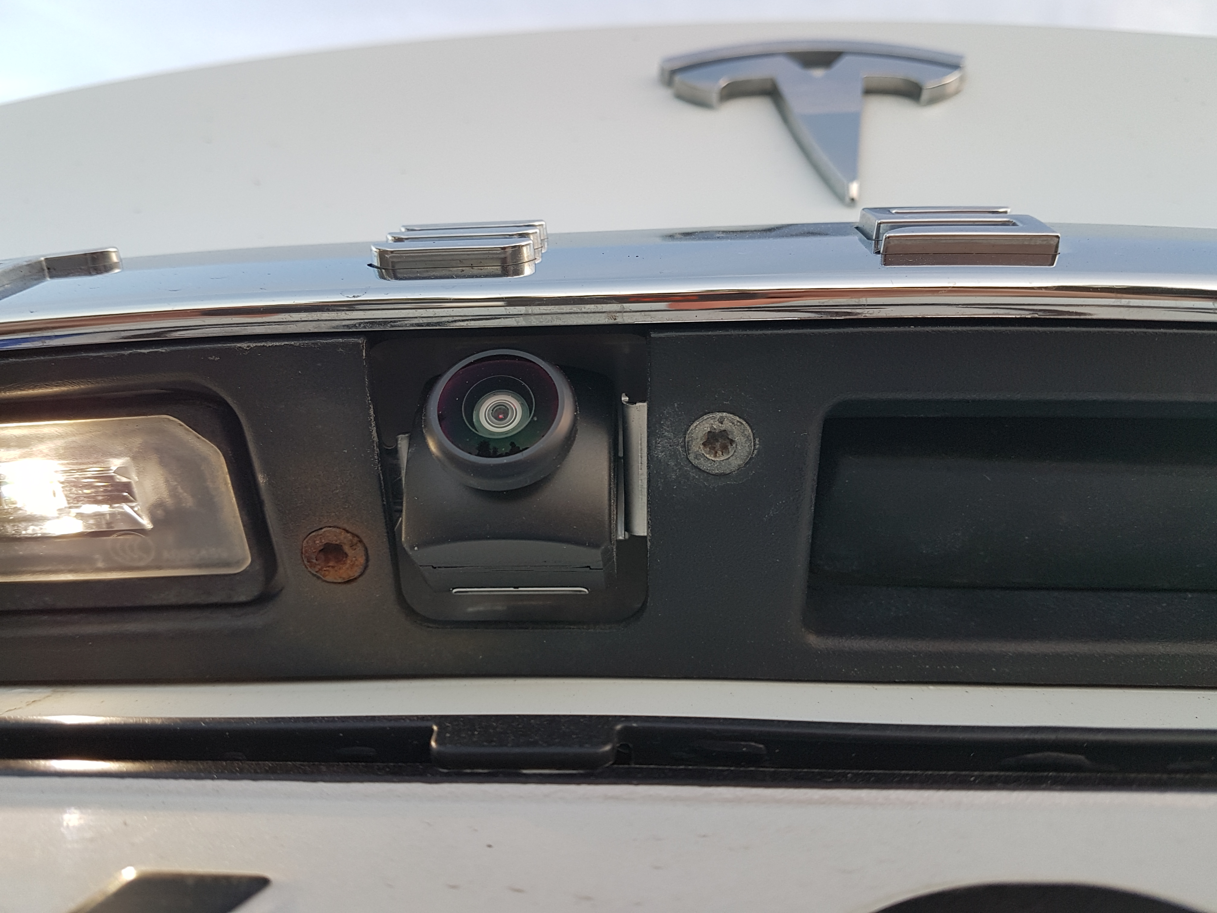 Tesla rear camera screw rusting August 2018